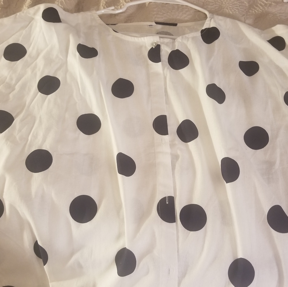 White blouse with black polka dots